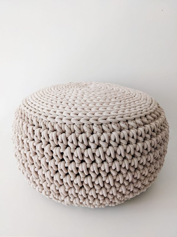 Round beige crochet pouf