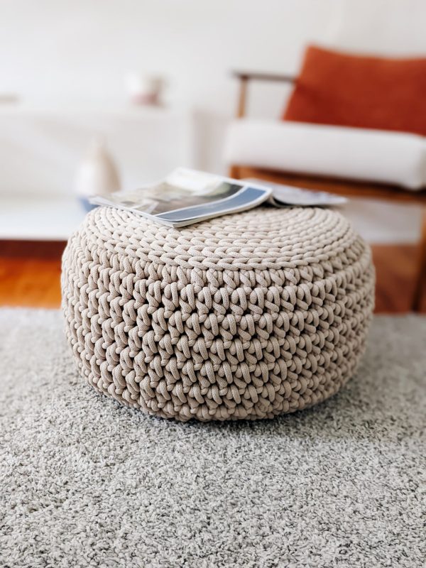 Round beige crochet pouf