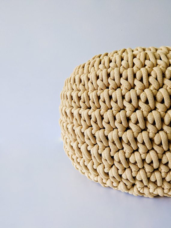 Yellow crochet pouffe